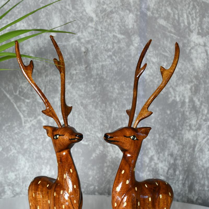 Pair Of Wooden Sitting Deer