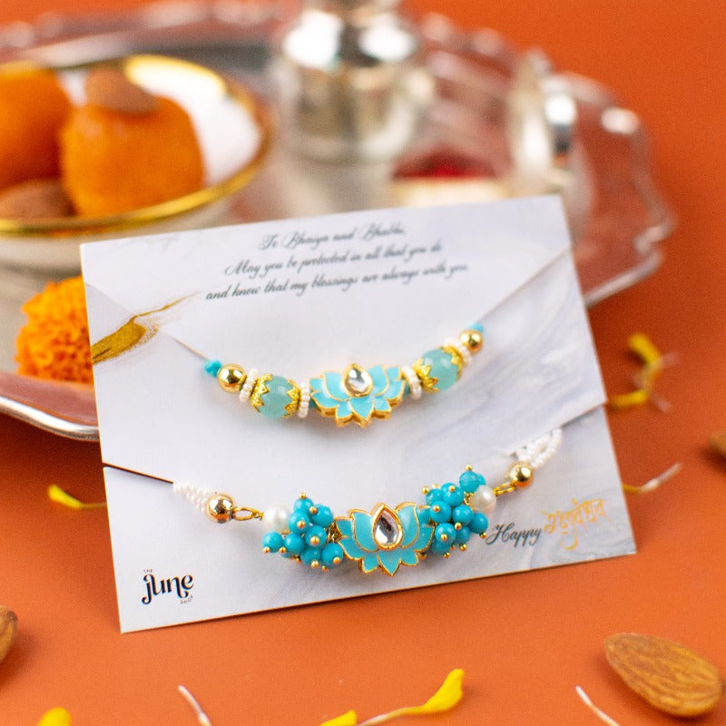 Sky Blue Lotus Bhaiya-Bhabhi Rakhi's (Set Of 2)