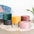 Elegant Suede Pouf With Gold Metal Stand Ottoman June Trading   